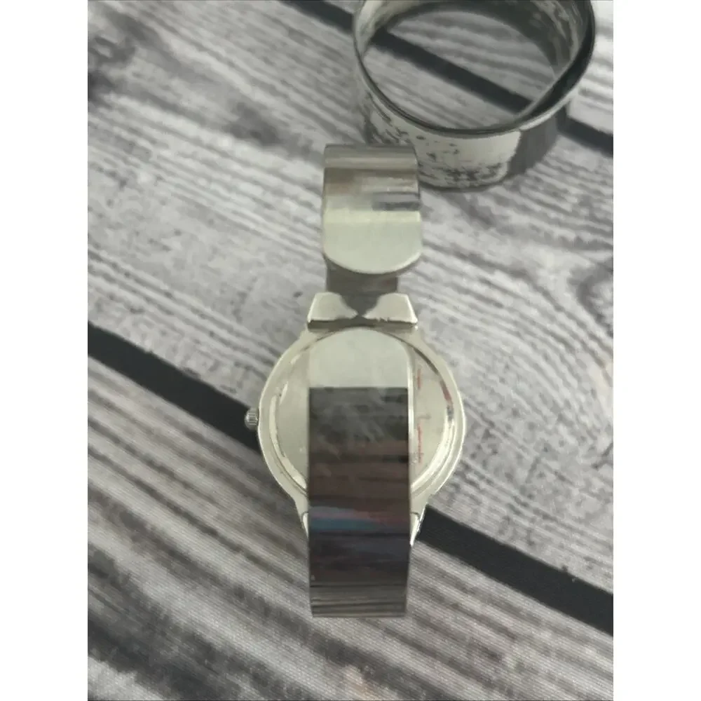 Studio Time Black Dial Silver Case And Band Women’s Cuff Watch